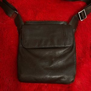 Small dark brown leather Tumi purse-model 69332bn